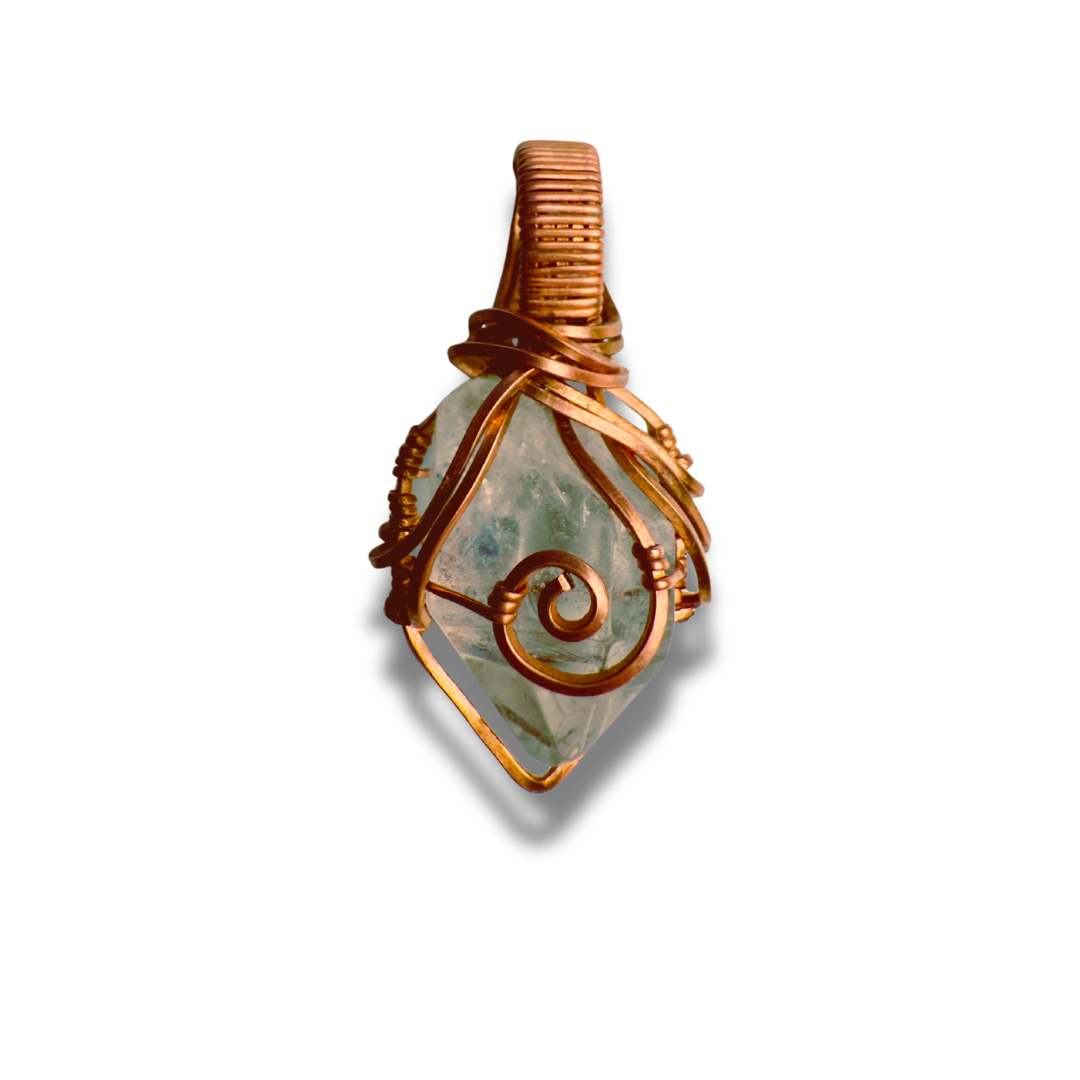 Copper-wrapped crystal pendant on a white background