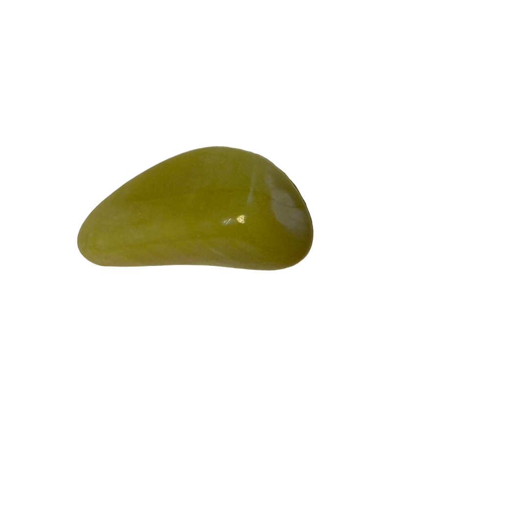 Green stone on a white surface