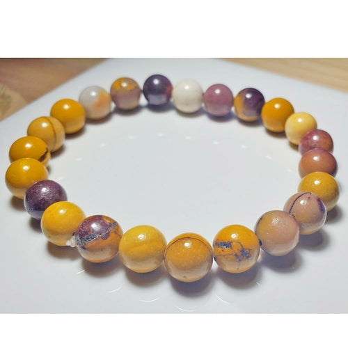 Multicolored beaded bracelet on a white surface