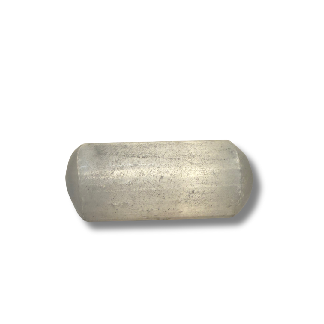Selenite cylindrical object on a white background